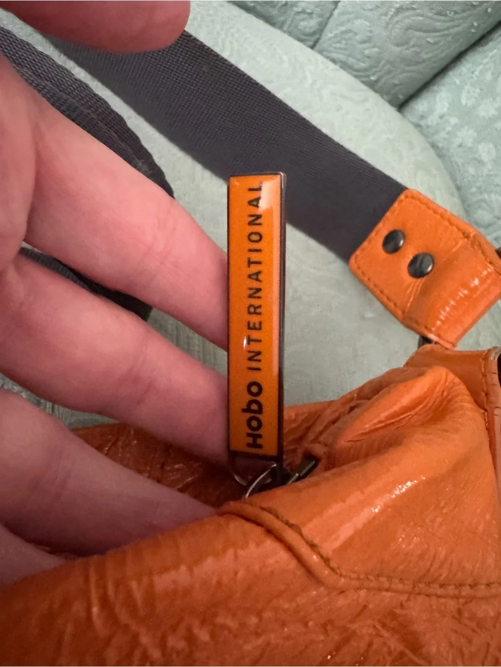Bright orange HOBO bag